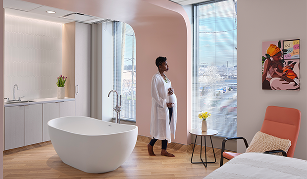Curved Architectural Features, Soft Soothing Colors, and Celebratory Artwork Welcome Patients In a D.C. Birthing Center